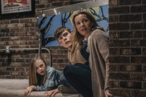 (from left) Sammy Mansell (Paisley Cadorath), Brady Mansell (Gage Munroe) and Becca Mansell (Connie Nielsen) in Nobody, directed by Ilya Naishuller.